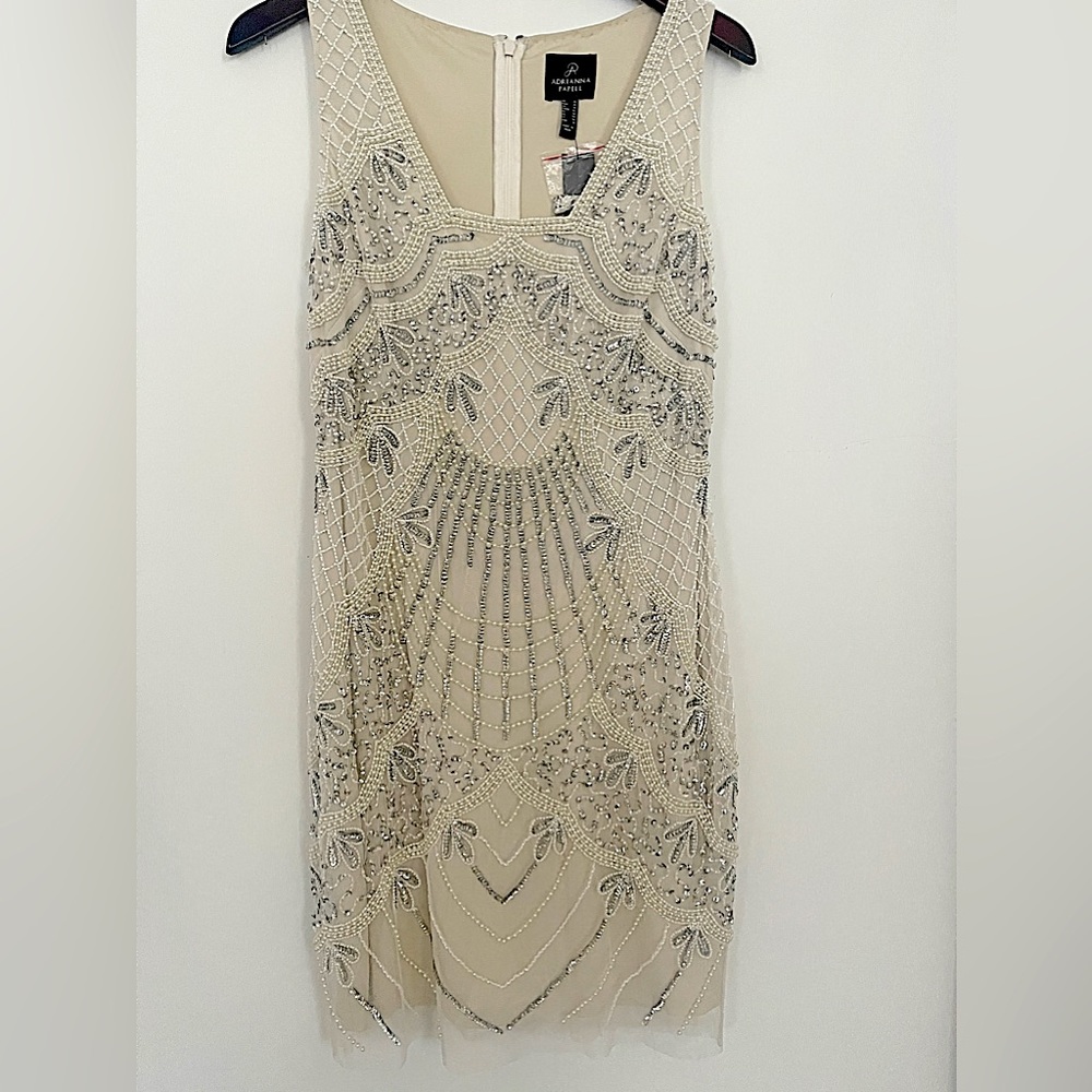 Brand new Adrianna Papell beaded dress.